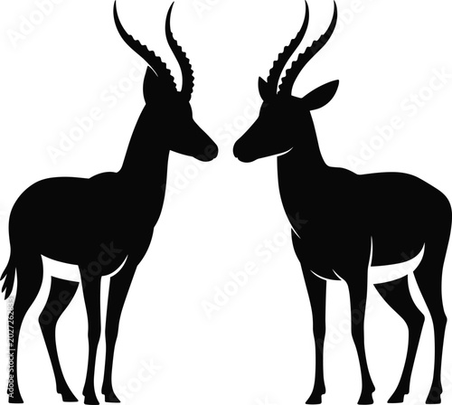 Canvas Print Two antelope silhouettes facing each other pitch black solid silhouette set wild
