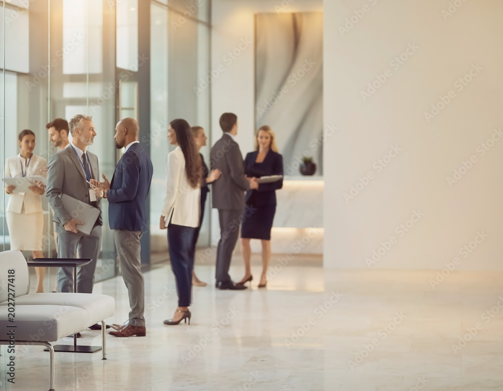 Fototapeta premium Blurred premium corporate office interior with elegant lighting and modern design. Luxury business workspace concept ideal for finance, management and executive themes.