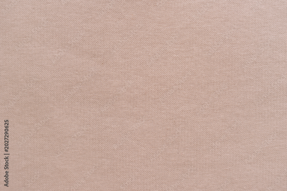 Fototapeta premium Beige fabric texture in close up.