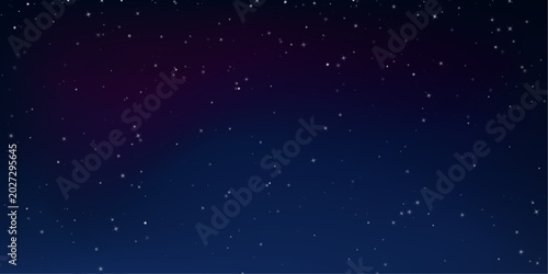 Tableau sur toile A deep navy sky is dotted with countless stars above towering mountains