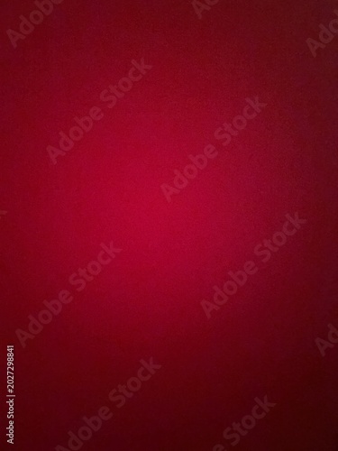 Bild auf Leinwand A vibrant red pixelated background with a circular gradient pattern