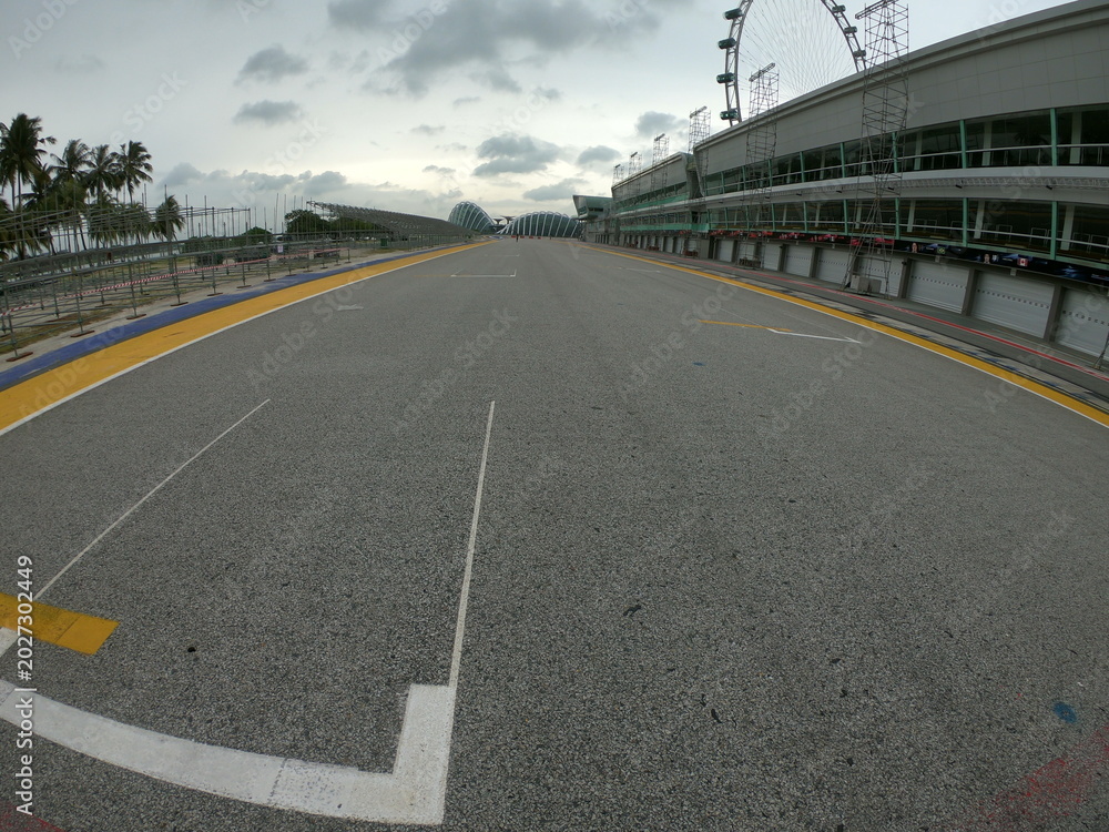 Naklejka premium Singapore / December 2017: Pit lane and start finish line of the Formula One Racing track at Marina Bay Street Circuit. 