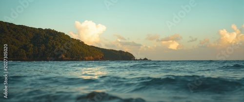 Calm waves washing against ...