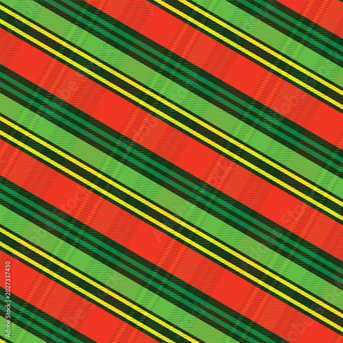 Vibrant neon green orange tartan plaid seamless fabric pattern background