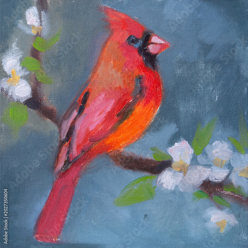 Dipinto a olio di un uccello cardinale rosso appollaiato su un ramo fiorito con fiori bianchi su sfondo azzurro sfumato