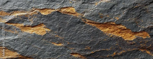 Panel kuchenny z motywem Close-up texture of rough dark grey slate interwoven with thin veins of golden-brown mineral