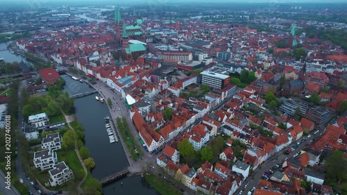 Aerial view around the old town of the city Lübeck in North Germany on a cloudy spring day