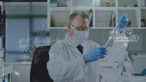 Scientist raising pipette, aspirating, dispensing into beaker for research with projected formulas