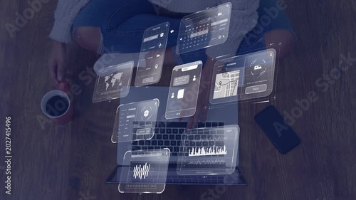 Woman typing on laptop for tech work, initiating floating UI panels, updating charts, mug nearby