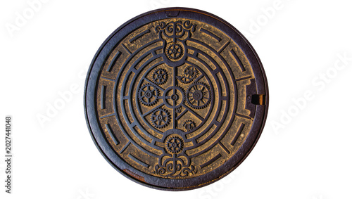 Foto Ornate circular metal manhole cover with gear pattern, isolated on transparent b