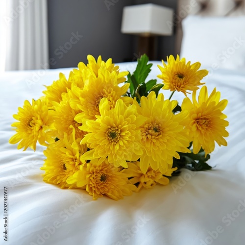 Bright Yellow Flowers on a Bed in a Hotel Room During Daylight Hours