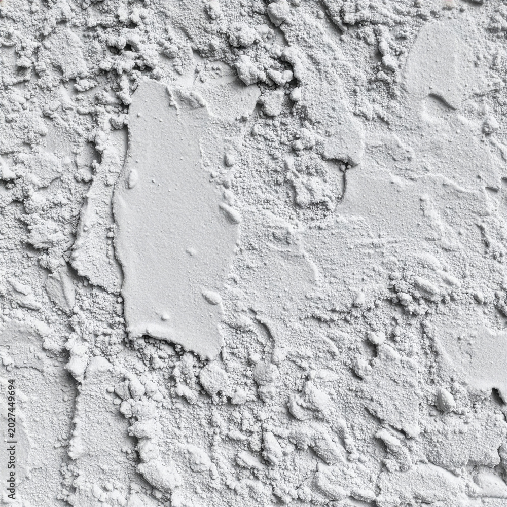 Obraz premium Coarse cement plaster with large particles, rough wall surface