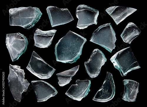 Shattered Glass Shards and Broken Fragments Collection Isolated on Black Background