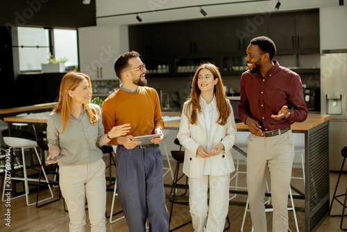 Group of four people discus...