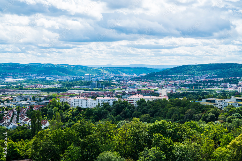 Fototapeta premium Germany, Aerial view over Stuttgart Killesberg rooftops towards scenic Neckar valley landscape
