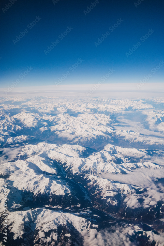 Fototapeta premium Blue Sky Over The Snowy Mountains Of Europe 