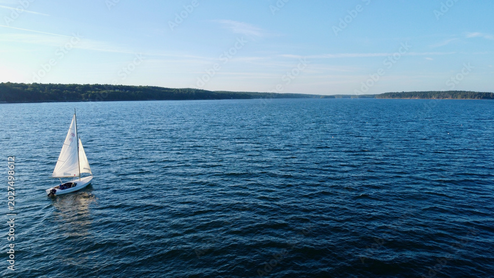 Fototapeta premium Aerial Sailboat Maine Coastal Bay Wide Open Water Drone