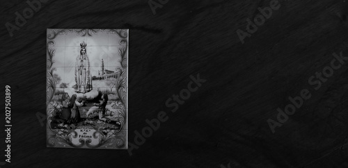 Fotografie Our Lady of Fatima devotional image on ceramic tile