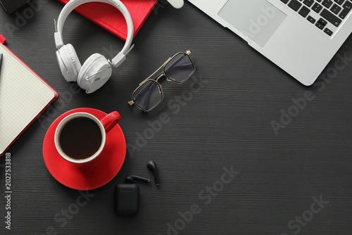 Cup of coffee with laptop, ...