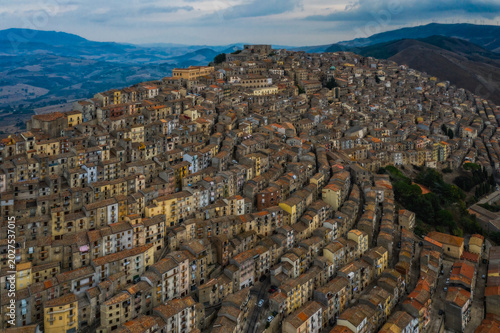 A drone perspective of the landmark hilltop town of Gangi in central Sicily. August 2024. Aerial panoramic picture.