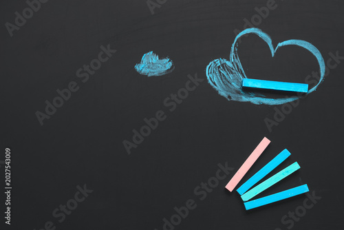 Colorful chalks with drawn ...