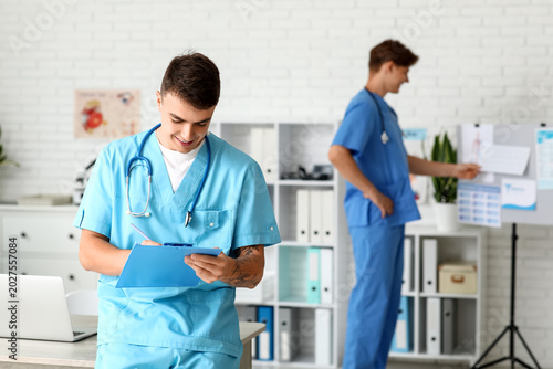 Male nurses working in mode...
