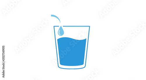 Tableau sur toile Glass of Water with Drop Falling.