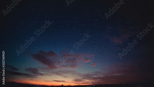 Starry Night Sky with Colorful Clouds