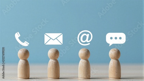 Four wooden figures represent different communication methods: phone