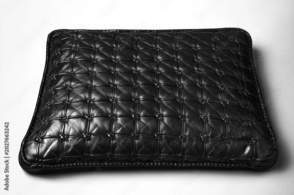 Fototapeta premium black quilted leather rectangular cushion with stitched border and tufted grid pattern, glossy sophisticated minimalist luxury