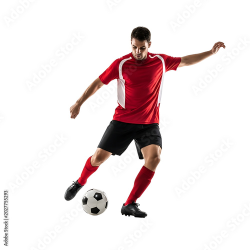 soccer player kicking ball