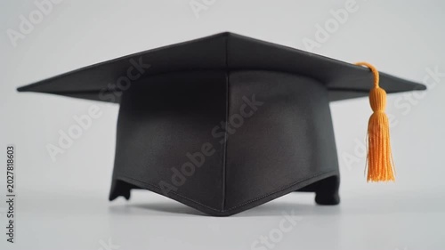 graduation cap and diploma