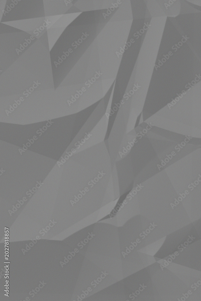 Fototapeta premium A pair of shiny metal silver scissors on a dark grey background