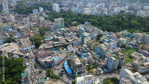 The aerial view of Chattogram city highlights the rapid urban expansion surrounding its remaining green hills and forests. Unplanned construction, hill cutting, and the destruction of trees.