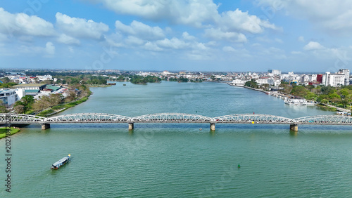 Fotografie Hue City, Vietnam – 4K aerial drone view of Perfume River, Truong Tien Bridge, h