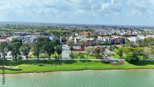 Tableau sur toile Hue City, Vietnam – 4K aerial drone view of Perfume River, Truong Tien Bridge, h