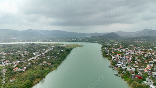 Vászonkép Hue City, Central Vietnam – 4K Aerial Drone View of Perfume River, Urban Skyline