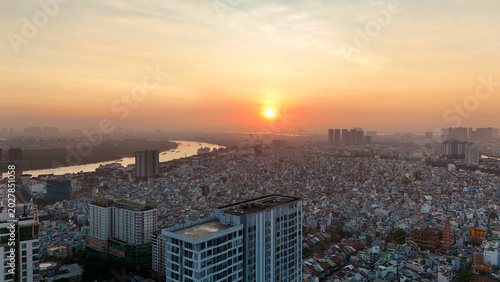 Foto Ho Chi Minh City, Vietnam – 4K aerial sunrise drone view of downtown skyline wit
