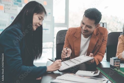 The salesperson presented details of the house and offered a price, along with information about the property, before we agreed to sign the purchase agreement.