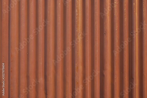 Foto Abstract industrial rusty weathered corrugated metal wall siding texture backgro