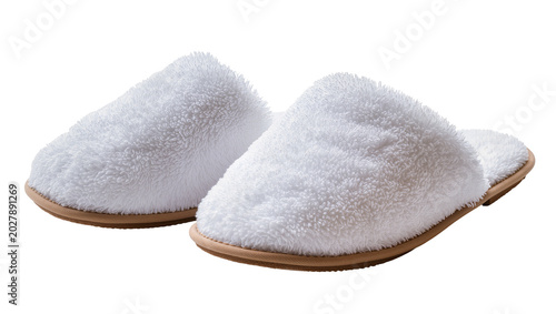 Fotografie Fluffy white terry cloth slippers with brown soles, isolated on transparent back