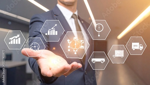 Businessman presenting digital technology icons in modern corporate workspace