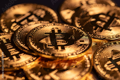 Tableau sur toile Physical Bitcoin coins are displayed in a studio setup illustrating cryptocurren