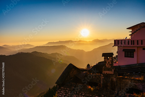 Photography Golden Sunrise Over Misty Mountain Ranges with Traditional Houses, Chakrata, Utt