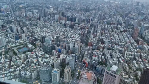 detailed cityscape panorama from above, capturing the immense density of Taipei's commercial and residential buildings