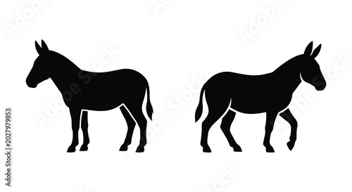 Bild auf Leinwand Two donkey silhouettes standing in profile against a white background silhouette