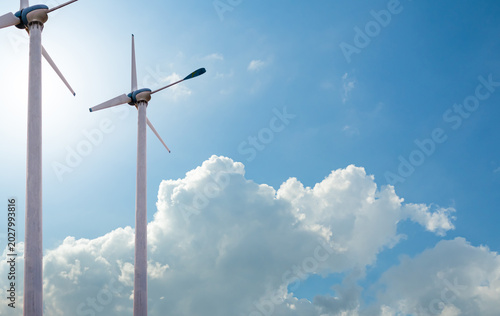 Wind mill power energy farm generator renewable sustainable field on blue sky, environment eco system technology industry ecology electricity power propeller turbine clean carbon.