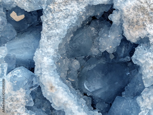 Fotografie Vibrant Blue Celestite Geode Macro Texture