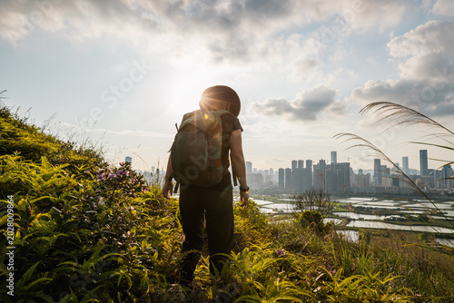 Photography Woman hiking on mountain top in Hong Kong