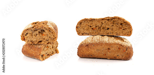 Bild auf Leinwand Whole wheat brown bread isolated, fitness pumpkin carrot buns with seeds, cereal